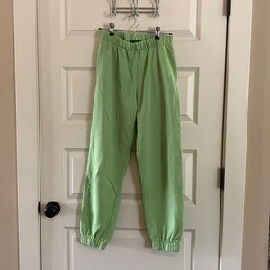 brandy melville rosa sweatpants in green